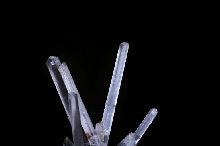 Chinese astronaut Professor Zhang Hongzhang works with experiment hardware inside the Tiangong space station to study battery performance in microgravity.