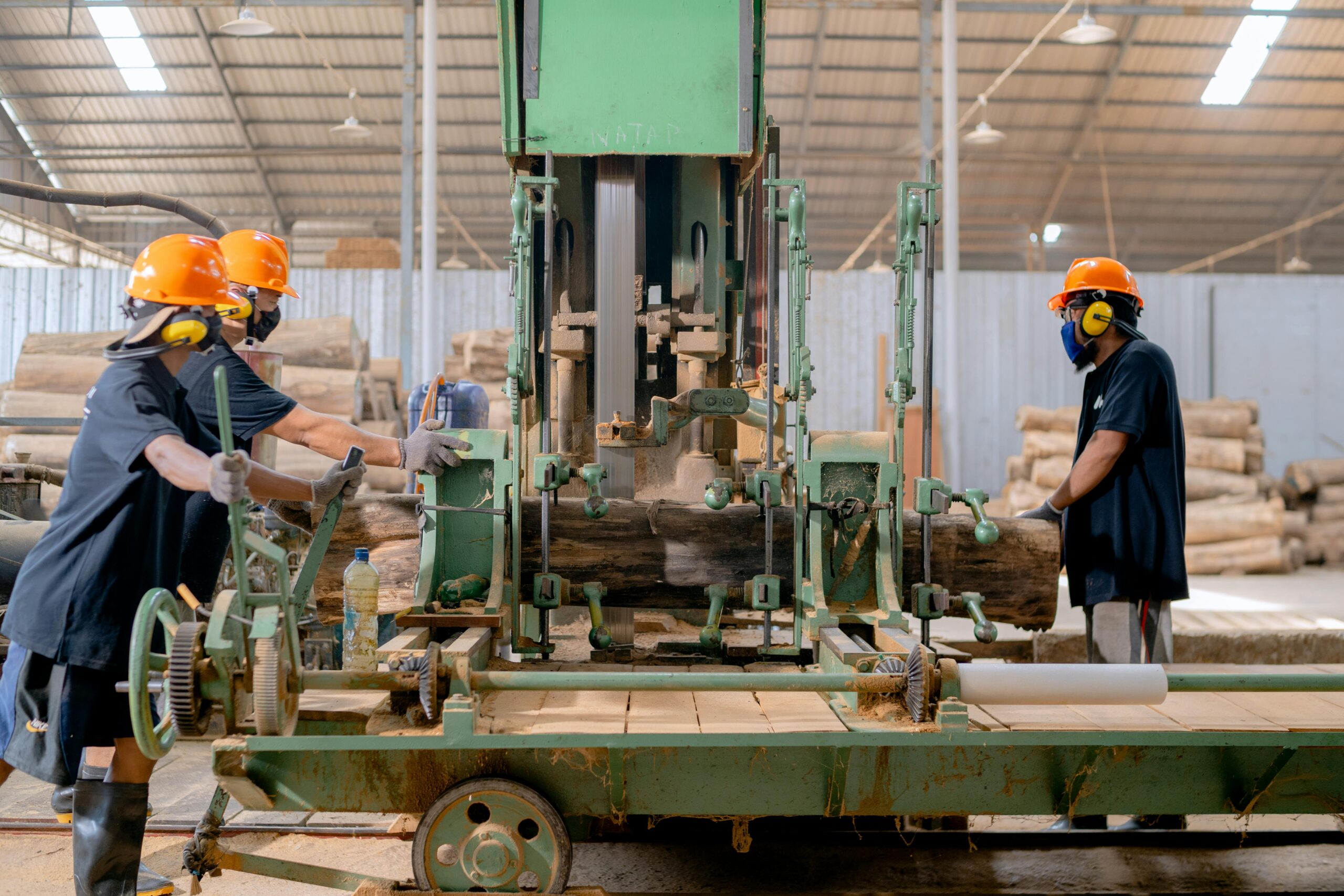 Engineers review plans at the construction site of Niron Magnetics' rare-earth-free magnet plant in Minnesota, built by Wood.