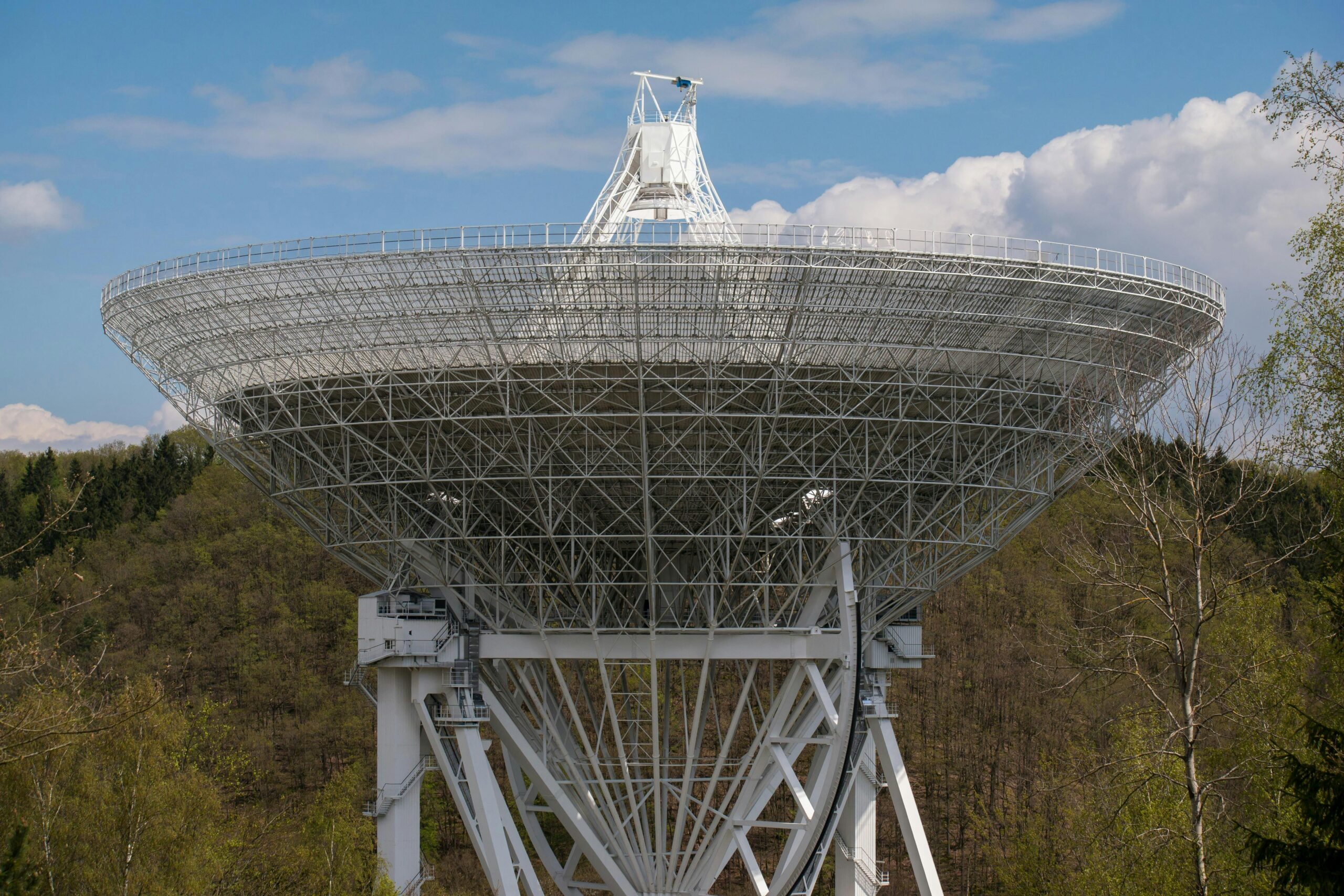A Starlink satellite dish set up in a Ukrainian field providing internet connectivity.
