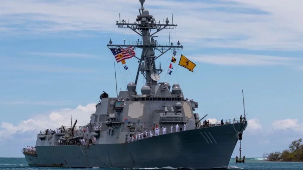USS Spruance fires its deck gun