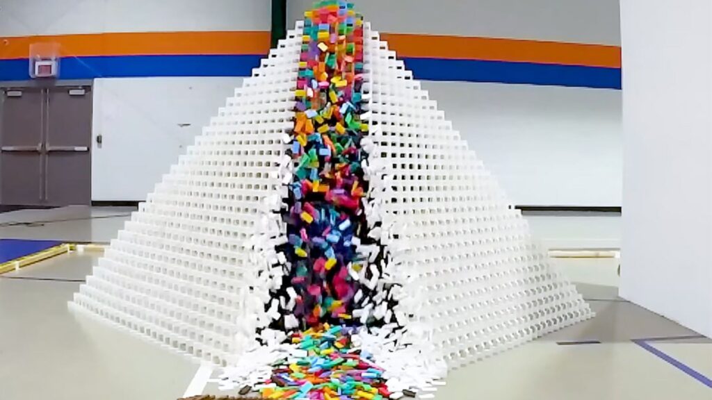 Team Sets World Record With 29,193-Domino Pyramid Toppled in One Chain Reaction
