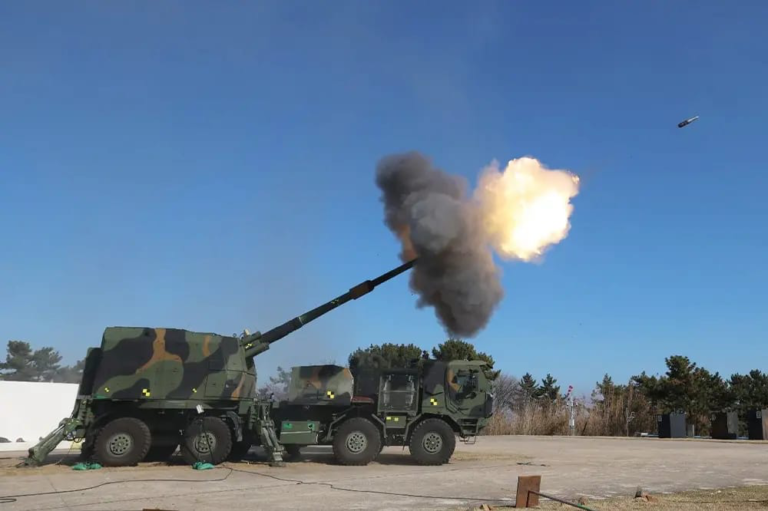 Hanwha K9 Mobile Howitzer wheeled 155mm artillery system during a military demonstration.
