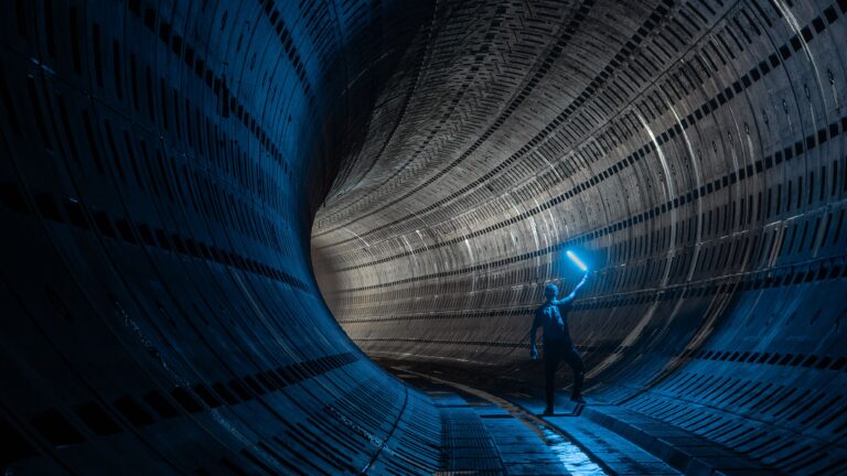 DUNE neutrino detector using AI to analyze particle interactions.