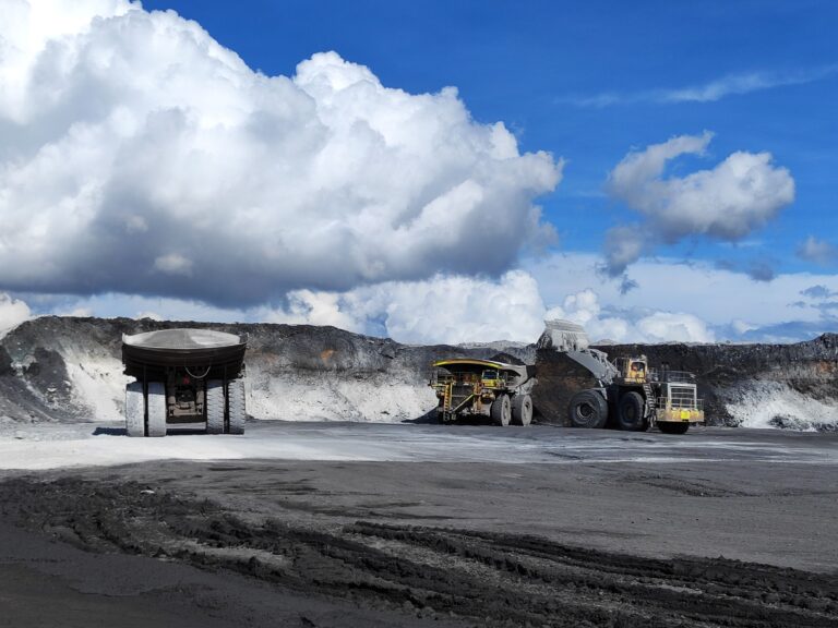 A large electric mining truck powered by a sodium-ion battery operating at a mining site in China