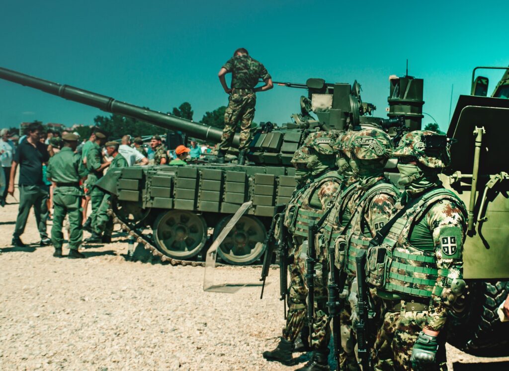 Tethered drone flying above a U.S. Army Infantry Squad Vehicle during field testing.