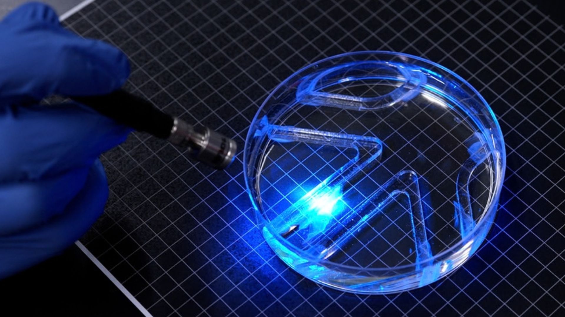 MIT engineers built a paper-thin swimming robot powered by one layer of living muscle cells that move when light hits them.